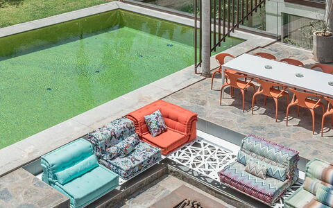 Villa Zaynab: Furniture, Outdoor Furniture, Couch, Floor, Chair, Living Room, Coffee Table, Patio, Design