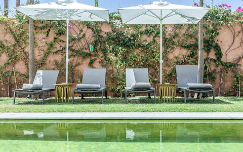 Villa Zaynab: Furniture, Outdoor Furniture, Chair, Garden, Outdoor Table, Shade, Umbrella, Patio, Design, Landscaping