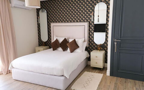 Villa Habiba: Furniture, Interior Design, Bedroom, Bed, Floor, Flooring, Bedding, Bed Sheet, Wood, Room