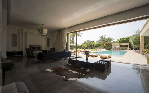 Villa Malak: Flooring, Floor, Interior Design, Furniture, Resort, Swimming Pool, Living Room, Couch, Ceiling