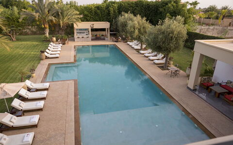 Villa Malak: Swimming Pool, Water, Resort, Outdoor Furniture, Thermae, Water Feature, Sunlounger, Composite Material, Eco Hotel, Umbrella