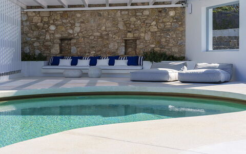 Villa Nikolas: Furniture, Outdoor Furniture, Composite Material, Swimming Pool, Resort, Concrete, Chair, Natural Material, Shade, Design