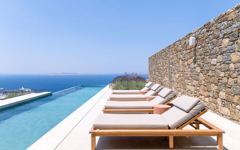 Villa Achille: Floor, Sea, Outdoor Furniture, Resort, Swimming Pool, Ocean, Sunlounger, Shade, Chair, Villa