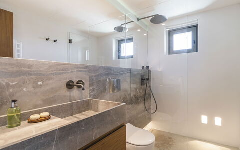 Villa Achille: Flooring, Plumbing Fixture, Wall, Bathroom, Interior Design, Floor, Sink, Countertop, Bathroom Sink, Light Fixture