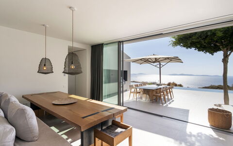 Villa Teseo: Furniture, Table, Floor, Interior Design, Kitchen & Dining Room Table, Chair, Flooring, Home, Sea, Shade
