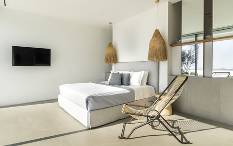 Villa Teseo: Wood, Flooring, Furniture, Floor, Interior Design, Ceiling, Bedroom, Chair, Throw Pillow, Bed