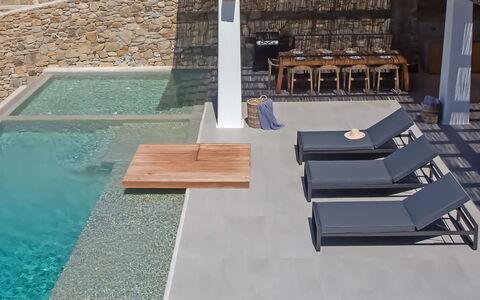 Villa Chimera: Swimming Pool, Composite Material, Outdoor Furniture, Resort, Concrete, Shade, Natural Material, Tile, Design, Chair