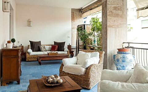 Casa Azul: Furniture, Interior Design, Couch, Living Room, Cushion, Throw Pillow, Flooring, Room, Floor, Table