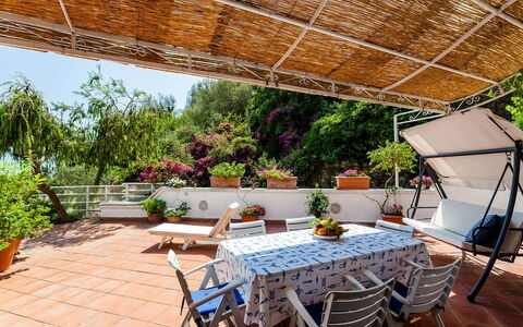 Casa Dorothea 1: Flowerpot, Furniture, Chair, Outdoor Furniture, Houseplant, Garden, Outdoor Table, Shade, Balcony, Patio
