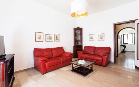 Casa Gina: Furniture, Interior Design, Flooring, Couch, Floor, Wood, Room, Living Room, Table, Ceiling