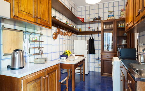 Casa Gina: Kitchen, Cabinetry, Wood, Countertop, Interior Design, Flooring, Furniture, Cupboard, Kitchen Appliance, Floor
