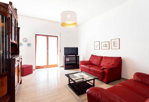 Casa Gina: Furniture, Interior Design, Flooring, Floor, Wall, Couch, Wood, Room, Living Room, Ceiling