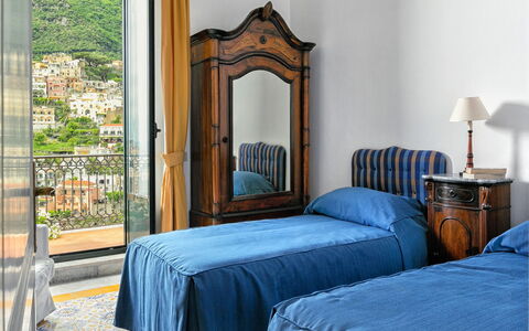 Casa Mauro: Bedroom, Furniture, Bed Sheet, Bed, Bedding, Bed Frame, Room, Linens, Nightstand, Curtain