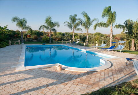 Villa Athena: Swimming Pool, Resort, Leisure, Shade, Composite Material, Eco Hotel, Outdoor Furniture, Flagstone, Tile, Umbrella