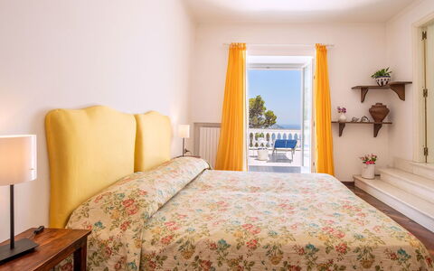 Villa Lamaro: Furniture, Interior Design, Yellow, Floor, Home, Bedroom, Room, Bed, Bed Sheet, Apartment