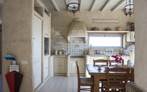 Villa Mycenaean: Furniture, Interior Design, Flooring, Floor, Kitchen, Chair, Home, Room, Lighting, Table