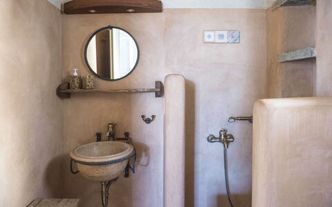 Villa Mycenaean: Wall, Plumbing Fixture, Bathroom Sink, Plumbing, Tap, Sink, Bathroom, Mirror, Wood Stain
