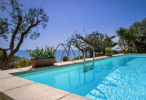 Villa Sea Breeze: Blue, Swimming Pool, Resort, Flowerpot, Eco Hotel, Houseplant, Shade, Hacienda, Villa, Hotel