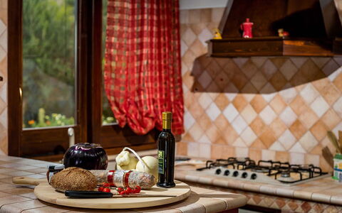 Villa Thyrrenia: Wood, Interior Design, Flooring, Kitchen, Floor, Room, Food, Wood Stain, Kitchen Appliance, Countertop