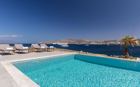 Carmen 1: Blue, Water, Swimming Pool, Resort, Coastal And Oceanic Landforms, Sea, Outdoor Furniture, Coast, Ocean, Hotel