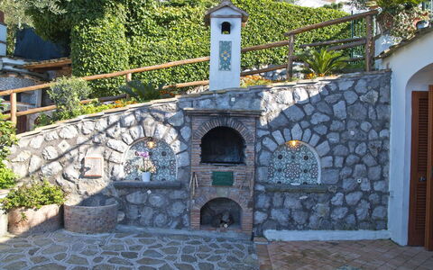 Casa 2 Ulivi: Stone Wall, Garden, Flowerpot, Landscaping, Cobblestone, Flagstone, Stairs, Houseplant, Hacienda, Water Feature