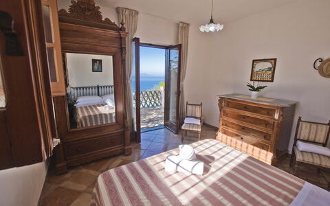Casa 2 Ulivi: Furniture, Sea, Floor, Ocean, Apartment, Bedroom, Coast, Chair, Bed, Resort