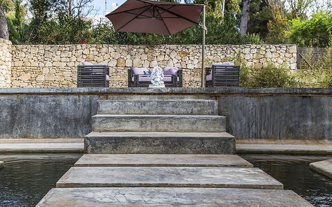 Casa Asia: Composite Material, Water Feature, Concrete, Swimming Pool, Garden, Landscaping, Shade, Natural Material, Design, Stairs
