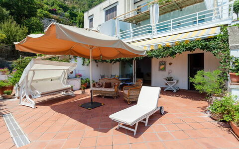 Casa Dorothea 2: Flowerpot, Balcony, Houseplant, Outdoor Furniture, Resort, Chair, Shade, Eco Hotel, Awning, Umbrella