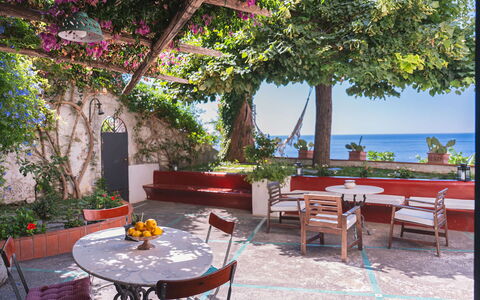 Casa Giardino: Furniture, Table, Sea, Flowerpot, Chair, Outdoor Furniture, Outdoor Table, Shade, Coast