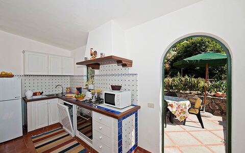 Positano View: Kitchen, Kitchen Appliance, Countertop, Major Appliance, Interior Design, Flooring, Furniture, Cabinetry, Floor, Kitchen Stove