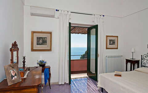 Positano View: Floor, Furniture, Flooring, Interior Design, Room, Picture Frame, Sea, Ocean, Bed, Wood Stain