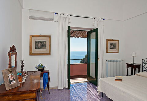 Positano View: Floor, Furniture, Flooring, Interior Design, Room, Picture Frame, Sea, Ocean, Bed, Wood Stain