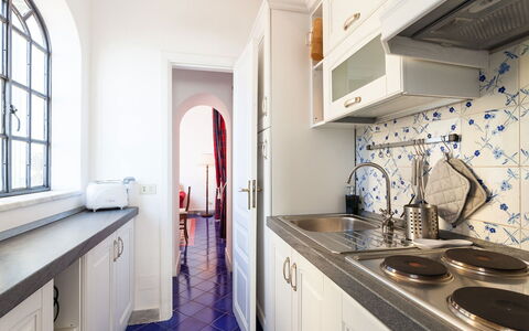 Casa Praiano: Flooring, Interior Design, Kitchen, Countertop, Floor, Major Appliance, Kitchen Appliance, Furniture, Cabinetry, Ceiling