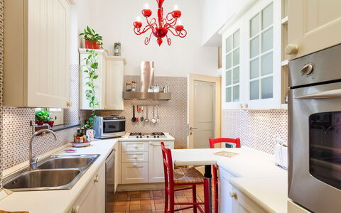 Casa Rossella: Kitchen, Interior Design, Countertop, Kitchen Appliance, Furniture, Cabinetry, Flooring, Major Appliance, Light Fixture, Home