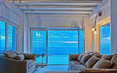 Fanaria Villa: Blue, Furniture, Sea, Chair, Ocean, Resort, Couch, Hotel, Living Room