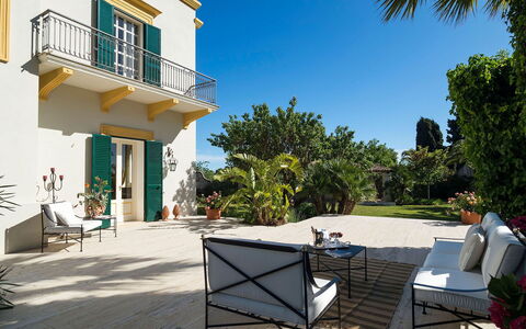 Green Villa: Blue, Green, Shrub, Shade, Chair, Garden, Estate, Balcony, Landscaping, Lawn