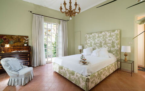 Green Villa: Furniture, Interior Design, Wall, Floor, Flooring, Bed, Bedroom, Room, Textile, Lighting