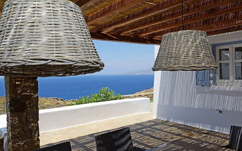 Krystalo: Furniture, Chair, Shade, Natural Material, Outdoor Furniture, Houseplant, Balcony, Resort, Wicker, Flowerpot