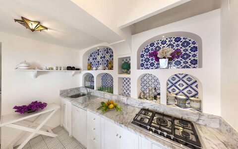 Mansour: Interior Design, Flooring, Floor, Tile, Kitchen, Design, Houseplant, Countertop, Floral Design, Flowerpot
