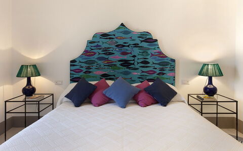 Mansour: Blue, Furniture, Interior Design, Bedroom, Wall, Floor, Bed Sheet, Bed, Bedding, Flooring