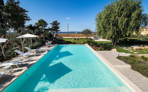 Salt Villa: Blue, Swimming Pool, Water, Resort, Outdoor Furniture, Leisure, Composite Material, Eco Hotel, Shade, Garden