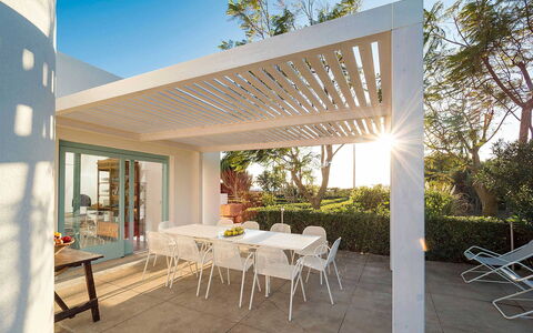 Salt Villa: Ceiling, Outdoor Furniture, Shade, Outdoor Structure, Pergola, Porch, Garden, Patio, Chair, Eco Hotel
