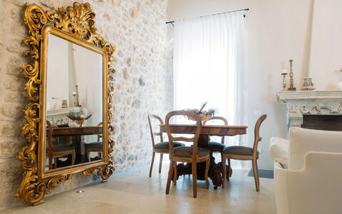 Villa Acreide: Interior Design, Furniture, Lighting, Mirror, Room, Chair, Molding, Picture Frame, Light Fixture, Living Room