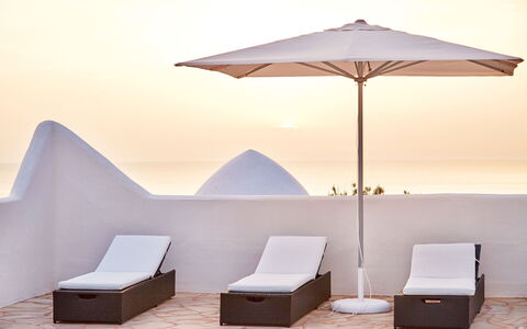 Villa Aldebaran: Furniture, Outdoor Furniture, Umbrella, Chair, Sea, Shade, Ocean, Sunlounger, Beach, Natural Material