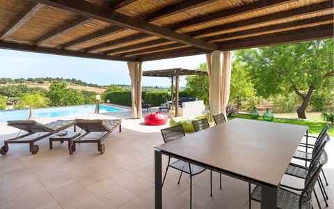 Villa Almond: Furniture, Chair, Flooring, Table, Outdoor Furniture, Interior Design, Swimming Pool, Resort, Kitchen & Dining Room Table, Shade