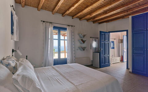 Villa Amaca: Blue, Furniture, Interior Design, Bedroom, Home, Floor, Apartment, Linens, Chair, Bed