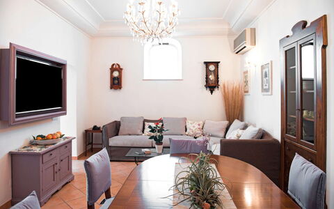 Villa Amanda: Furniture, Interior Design, Couch, Table, Living Room, Wood, Flooring, Room, Lighting, Apartment