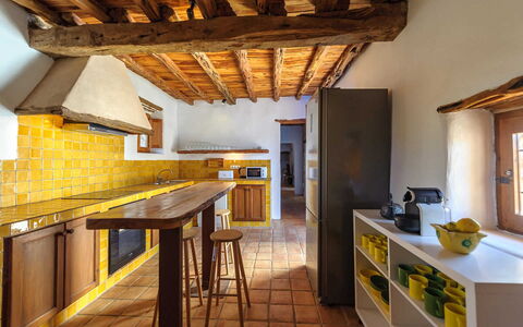 Finca Tonia: Wall, Flooring, Interior Design, Wood, Kitchen, Yellow, Ceiling, Furniture, Floor, Countertop