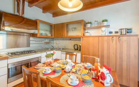 Villa Cremia: Kitchen, Wood, Interior Design, Flooring, Countertop, Furniture, Ceiling, Cabinetry, Room, Floor