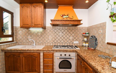 Villa del Mare: Kitchen, Countertop, Interior Design, Flooring, Wood, Cabinetry, Major Appliance, Kitchen Stove, Kitchen Appliance, Floor